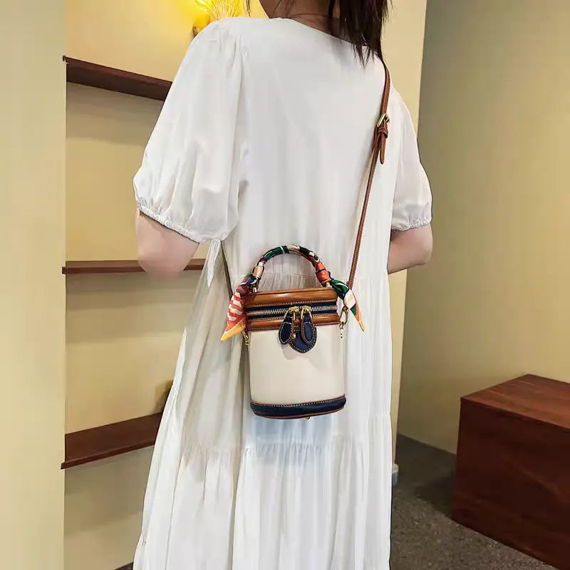 Colorblocked cylindrical bag 2025 new niche design retro handbag messenger bag FairWonder
